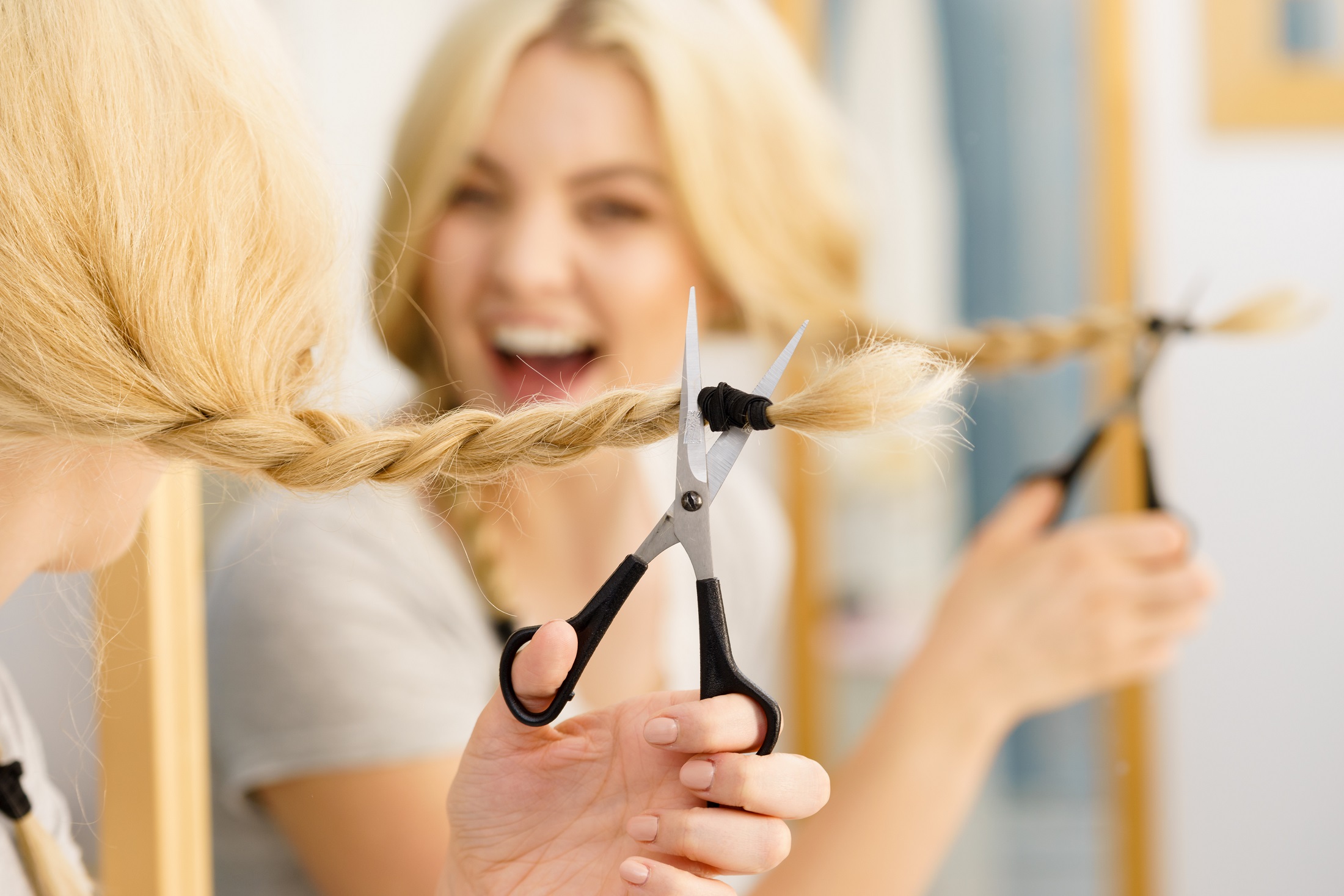 No time for a haircut? Here are a few tips to help you cut your hair or bangs yourself without regretting it